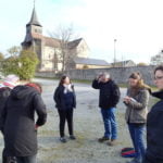 Le groupe, lors de la visite du centre-bourg de Champagnat avec les élues et l’agent municipal